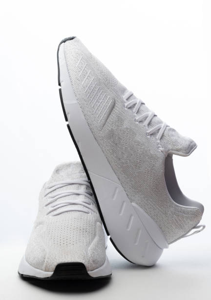 istock Clean pair of white sport shoes 1401814233