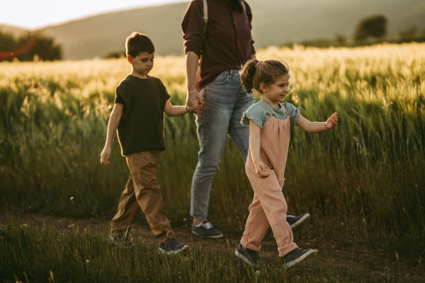 istock Family taking a walk in nature 1401817397