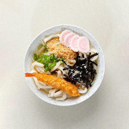 Japanese Shrimp Tempura Udon Noodle with Nori Laver, Sesame Seed Topping, Top View with Copy Space for Text