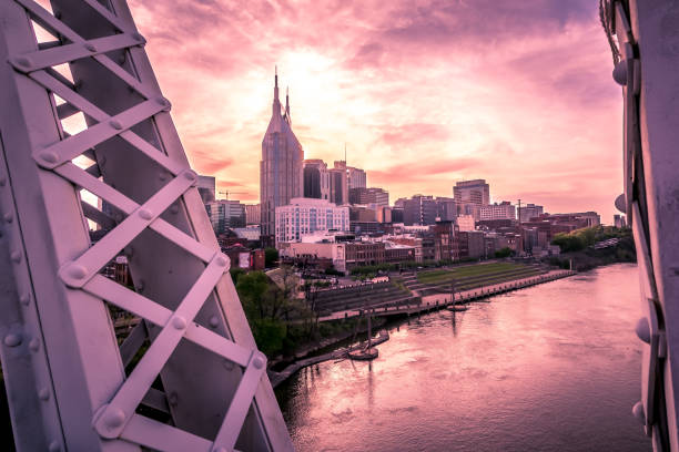 Nashville tennessee city skyline at sunset on the waterfrom stock photo