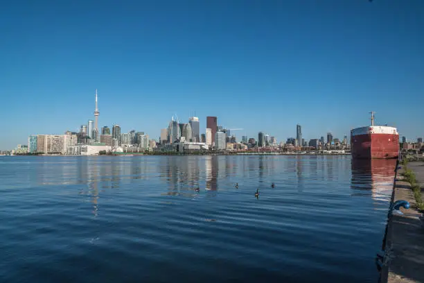 Toronto skyline from Ontario lake in sunny morning