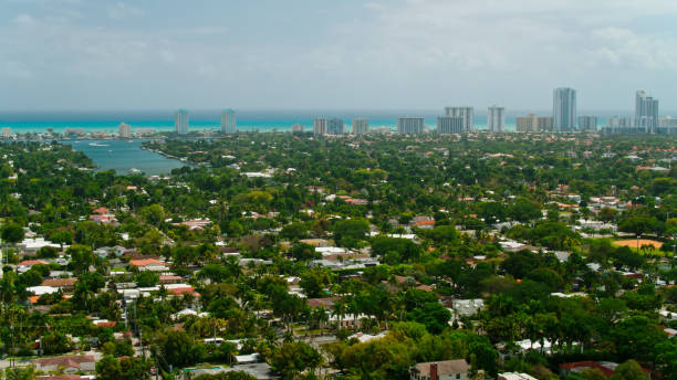 Aerial Shot of Houses and High Rises in Hollywood, Florida Aerial shot of houses in Hollywood, Florida, with condo towers in the distance. 

Authorization was obtained from the FAA for this operation in restricted airspace. hollywood florida stock pictures, royalty-free photos & images