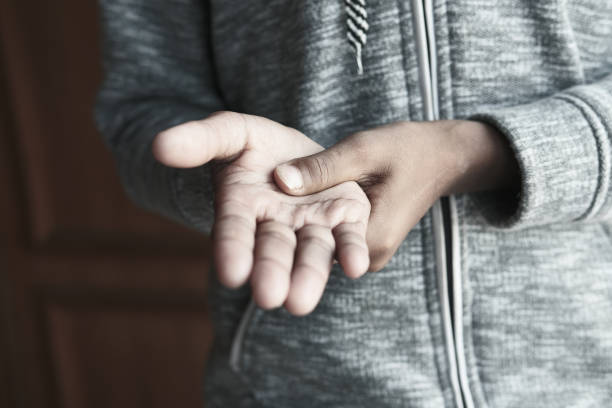 istock man suffering pain in hand close up 1401837336