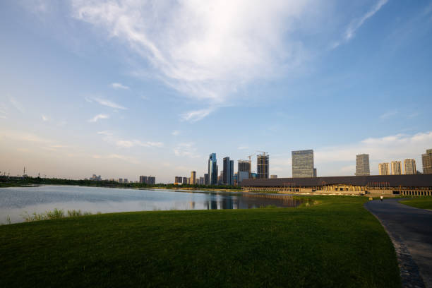 istock Modern city by the river at dusk 1401839130
