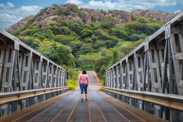 The Metal Bridge of Tobati (Puente de metal de Tobati) is one of the sights of the city in Paraguay. Especially with the impressive panorama of the Cordelliers in the background. stock photo