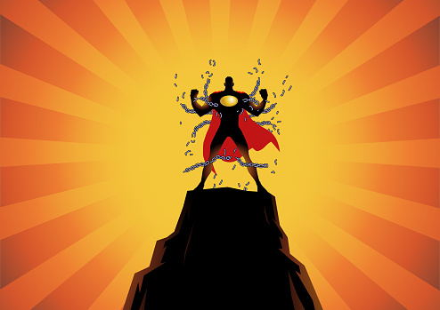 A silhouette style vector illustration of a superhero breaking chains standing on top of a mountain. Wide space available for your copy.