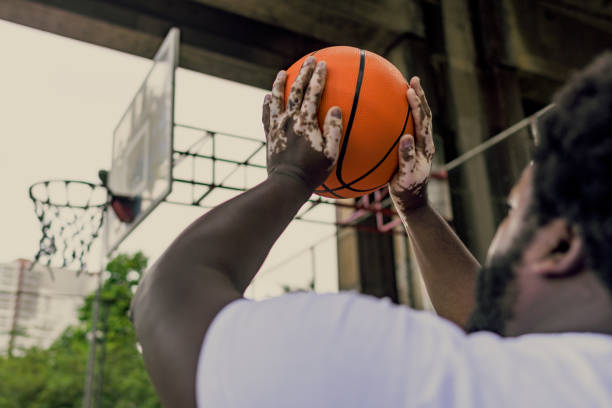 istock A man with vitiligo playing basketball 1401849490