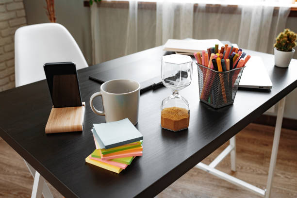 istock Office desk with stationery items and laptop 1401852410