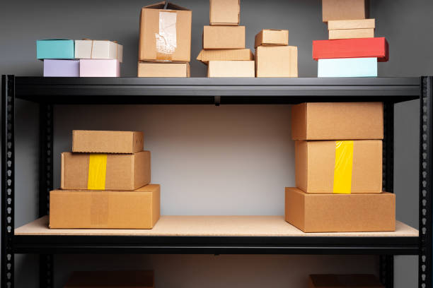 istock Rows of shelves with cardboard boxes in modern warehouse 1401852701