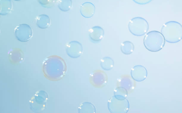 istock Abstract Beautiful Transparent Soap Bubbles Background. Soap Sud Bubbles Water 1401856951