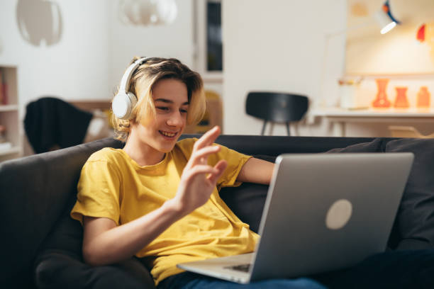 istock teenager boy at home 1401861596