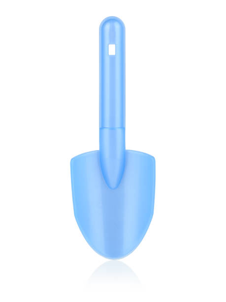 istock Children's blue shoulder blade. A shovel for playing with sand. Shoulder blade on a white background. The concept of the construction 1401862211