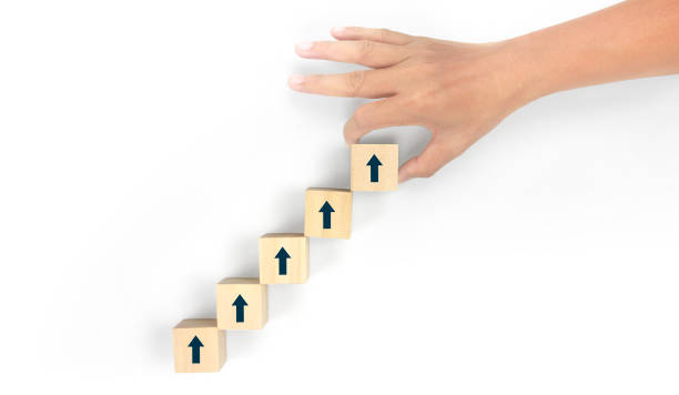 istock Business connecting piece of multi wood chart blocks steps in hand 1401862333