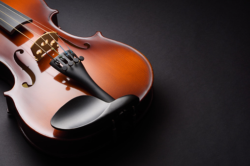 Violin on black table with copy space.