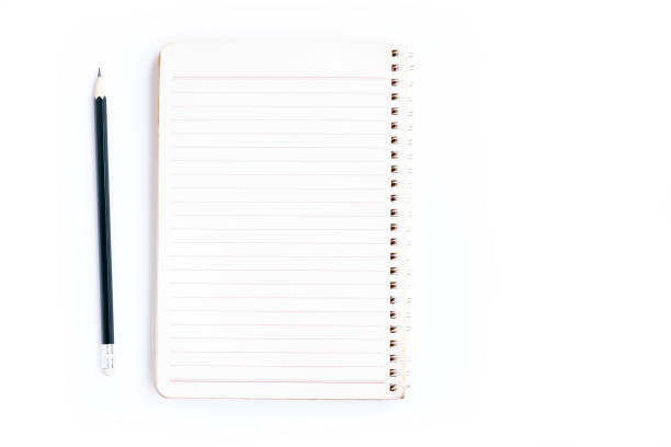 Notebook and Black pencil isolated on a white background