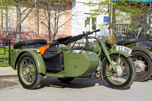 Ekaterinburg, Russia - May 9, 2012: Green Soviet motorcycle IMZ M-72 takes part in the retro car show of the Victory Day.