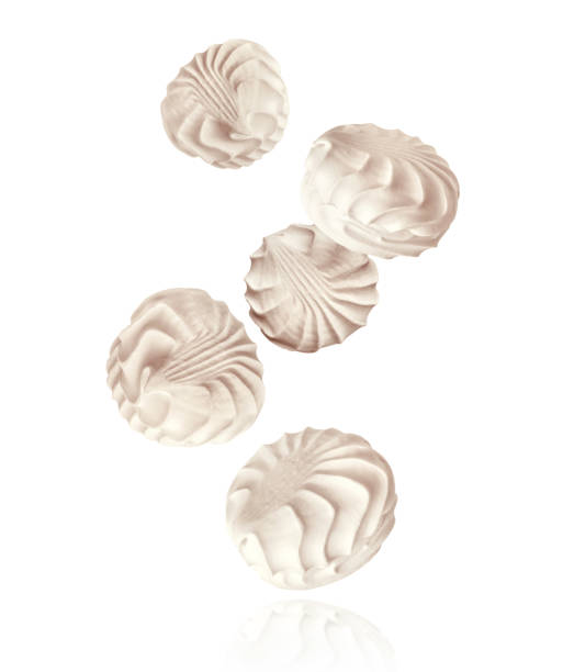 istock Delicious vanilla zephyr in the air isolated on a white background 1401865845