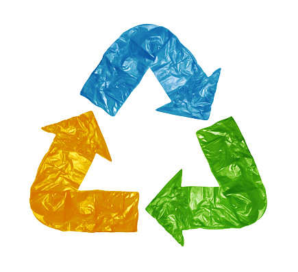 The sign of recycling created by colorful garbage bags