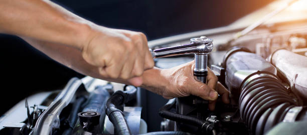 istock Car mechanic working on car engine, car maintenance concept. 1401866212