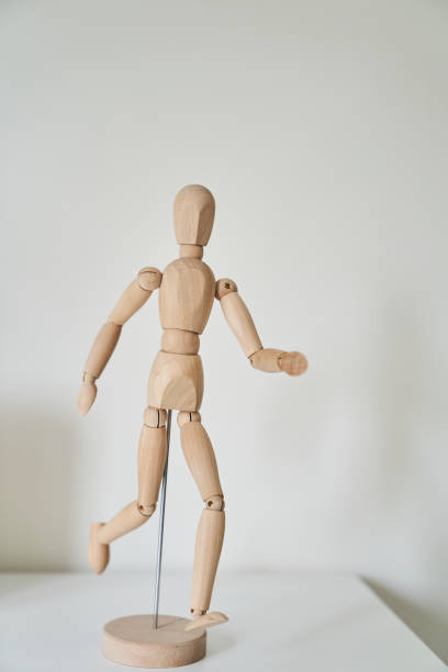 istock articulated manikin in running position 1401871879