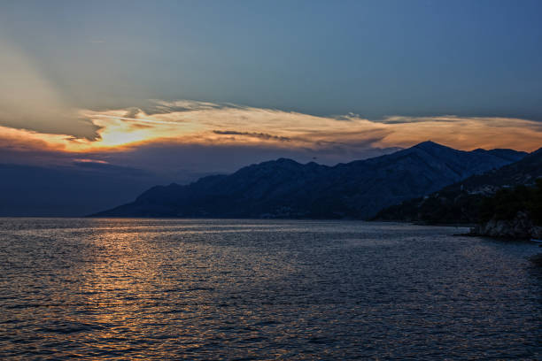 istock Croatia - Brela seascape sunset mountain view 1401871889