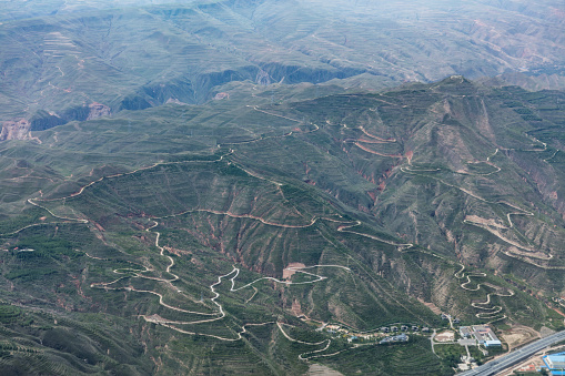 The winding natural terrain captured by aerial view in Gansu Province, China