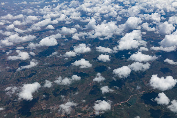 The sea of clouds floating on the mountains seen from the plane in Gansu Province, China