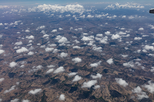 The sea of clouds floating on the gobi desert seen from the plane in Gansu Province, China