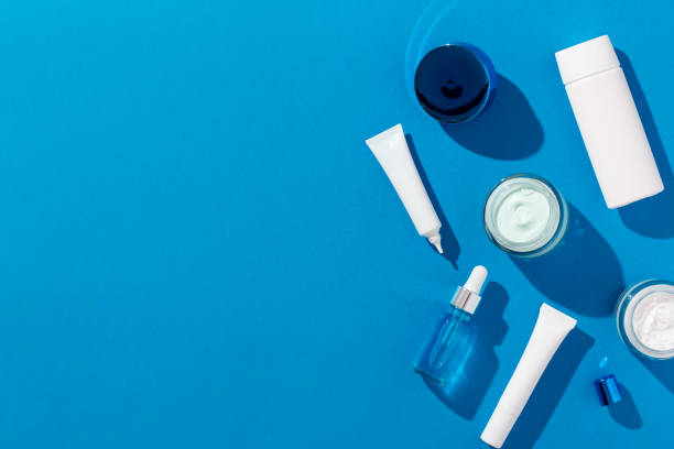 istock Skin care cosmetics protecting from gadgets blue light on blue background 1401878942
