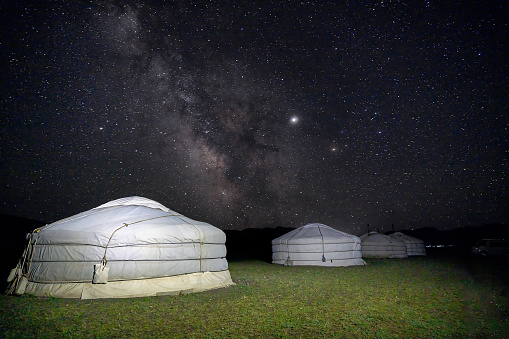 Milky way in the sky at night in Mongol desert at a ger tent camp