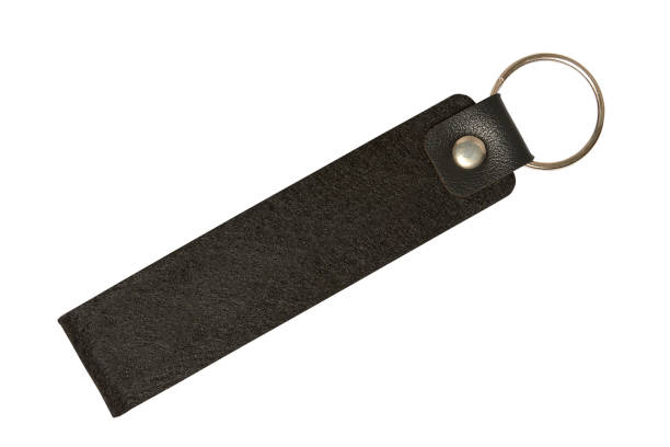 istock Black key holder isolated on white background 1401880299