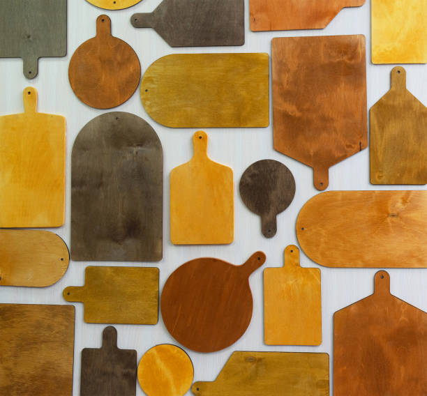 istock Kitchen ooking wooden boards on the white wall background. 1401883263