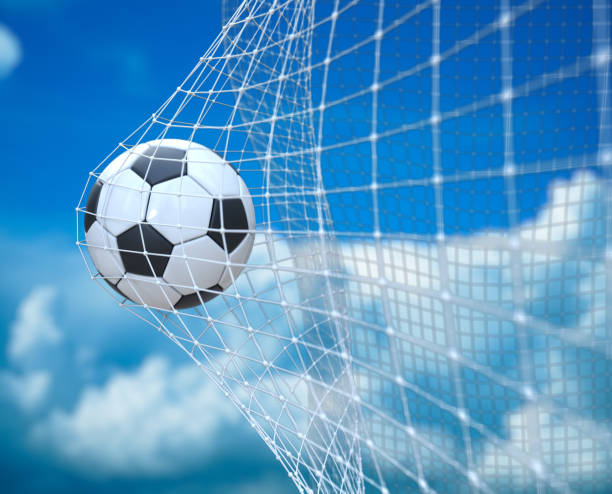 istock Soccer Ball In Goal With clouds bg 1401885325
