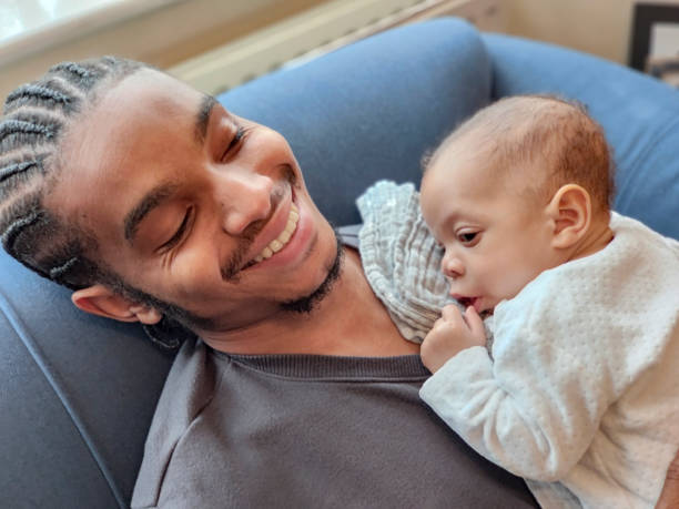 istock Happy young father with baby daughter 1401885367