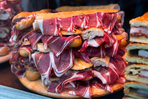 istock Sandwiches with Spanish ham on bar window in Madrid 1401887832
