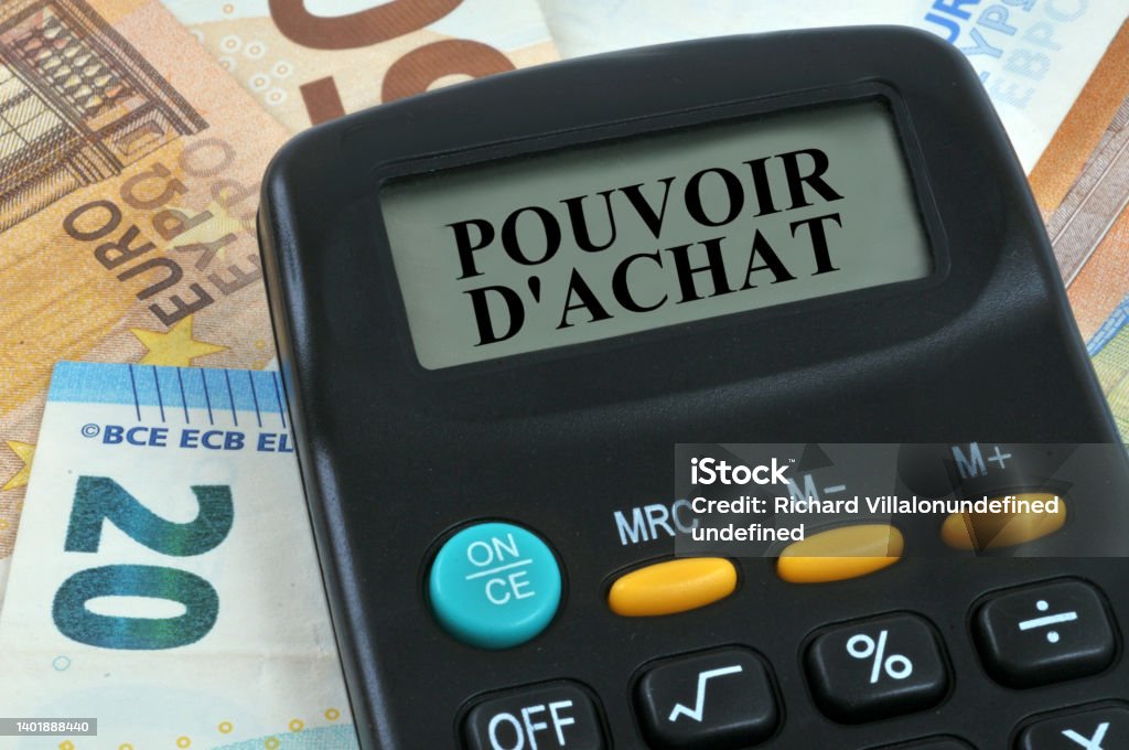 Le pouvoir d'achat Purchasing power concept with a calculator on euro banknotes Banking Stock Photo