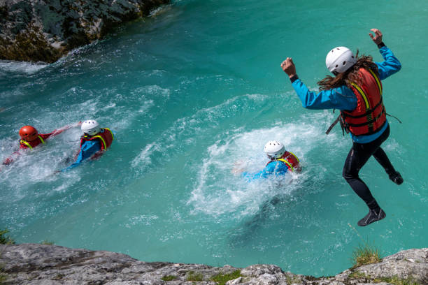 istock Woman jumping into river 1401891377