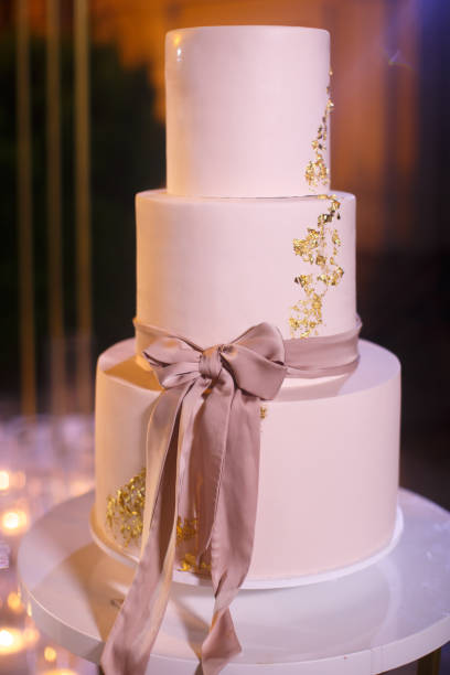 istock Multilevel wedding cake tied with a pink bow 1401894737