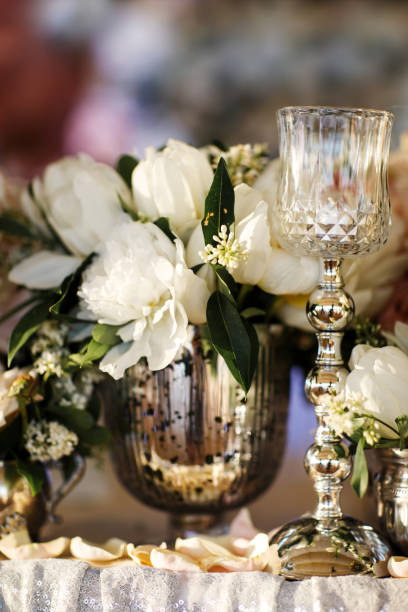 istock Bouquet flower in vase on the wedding table 1401894767
