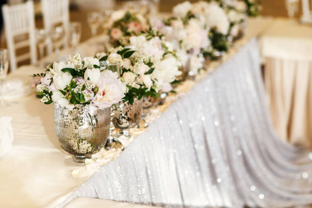 istock Bouquets flower in vase on the wedding table 1401894771
