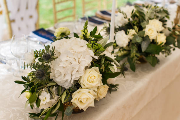 istock Bouquets flower in vase on the wedding table 1401894810