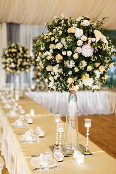 istock Table set for wedding with a beautiful flowers 1401894825