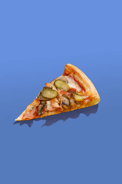 istock Slice of pizza on colorfull background 1401895684