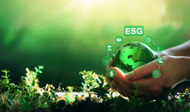 istock Hands holding crystal globe with  ESG icons. Using technology of renewable resource to reduce pollution. Environment social and 
governance in sustainable and ethical business. 1401896710