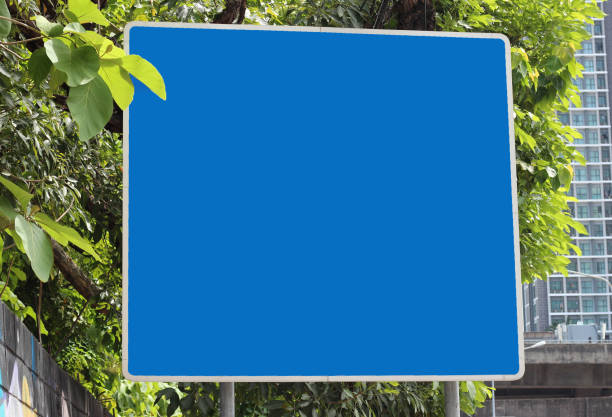 Blank sign in garden background.