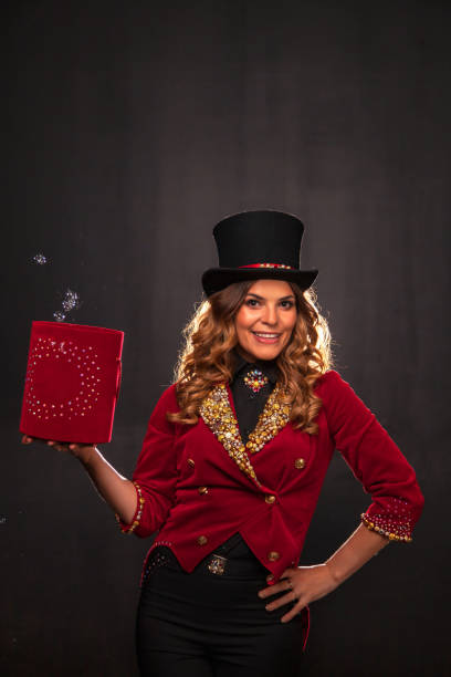 istock Female magician makes with soap bubbles show, an illusionist 1401898101