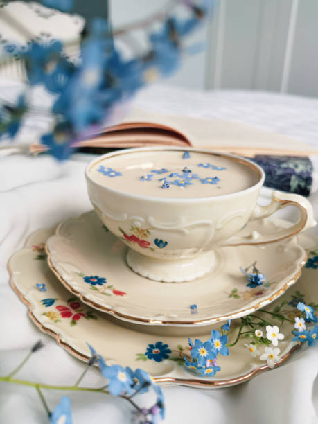 istock erlgray tea with milk and flowers 1401898300