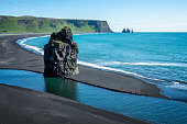 View of Reynisfjara, a famous black sand beach in the South Coast of Iceland