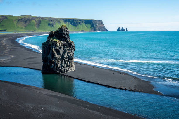 View of Reynisfjara, a famous black sand beach in the South Coast of Iceland stock photo
