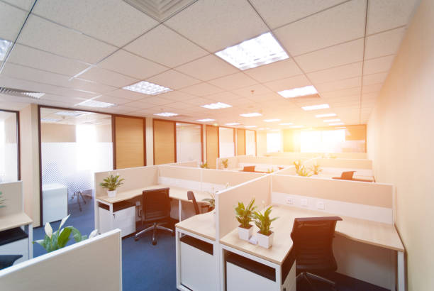 istock Working area in modern office with carpet floor and meeting room 1401903456